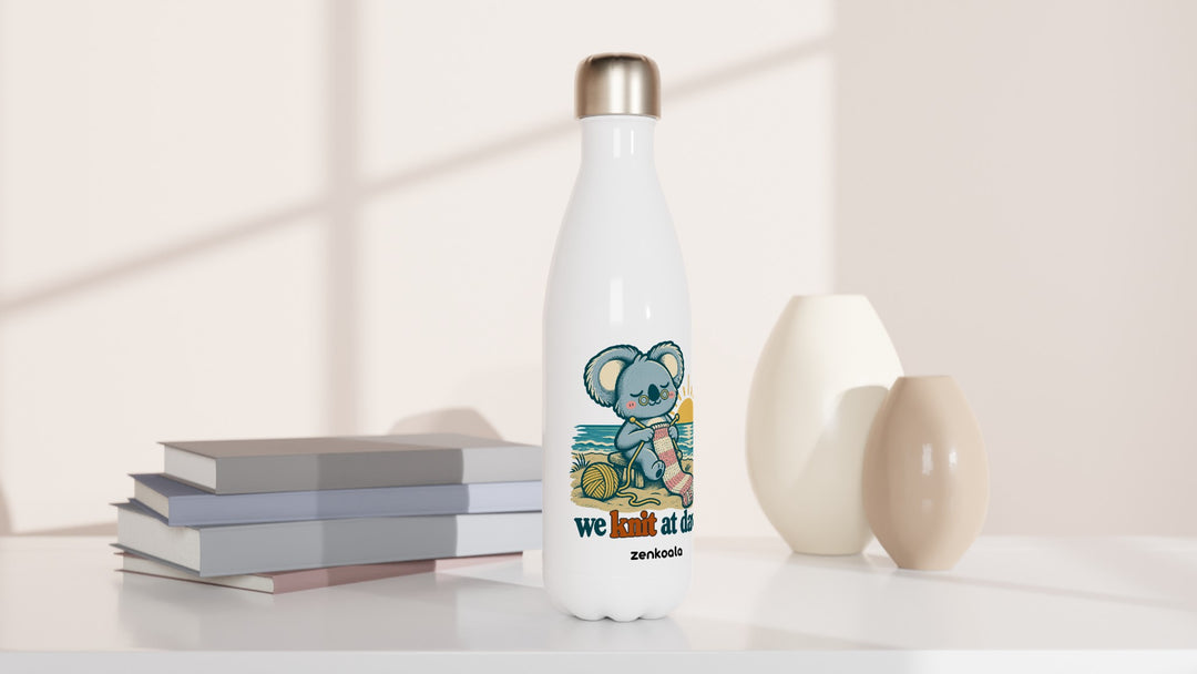 We Knit at Dawn water bottle beside books and vases, Zen Koala Australia