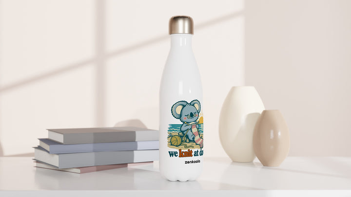 We Knit at Dawn water bottle beside books and vases, Zen Koala Australia