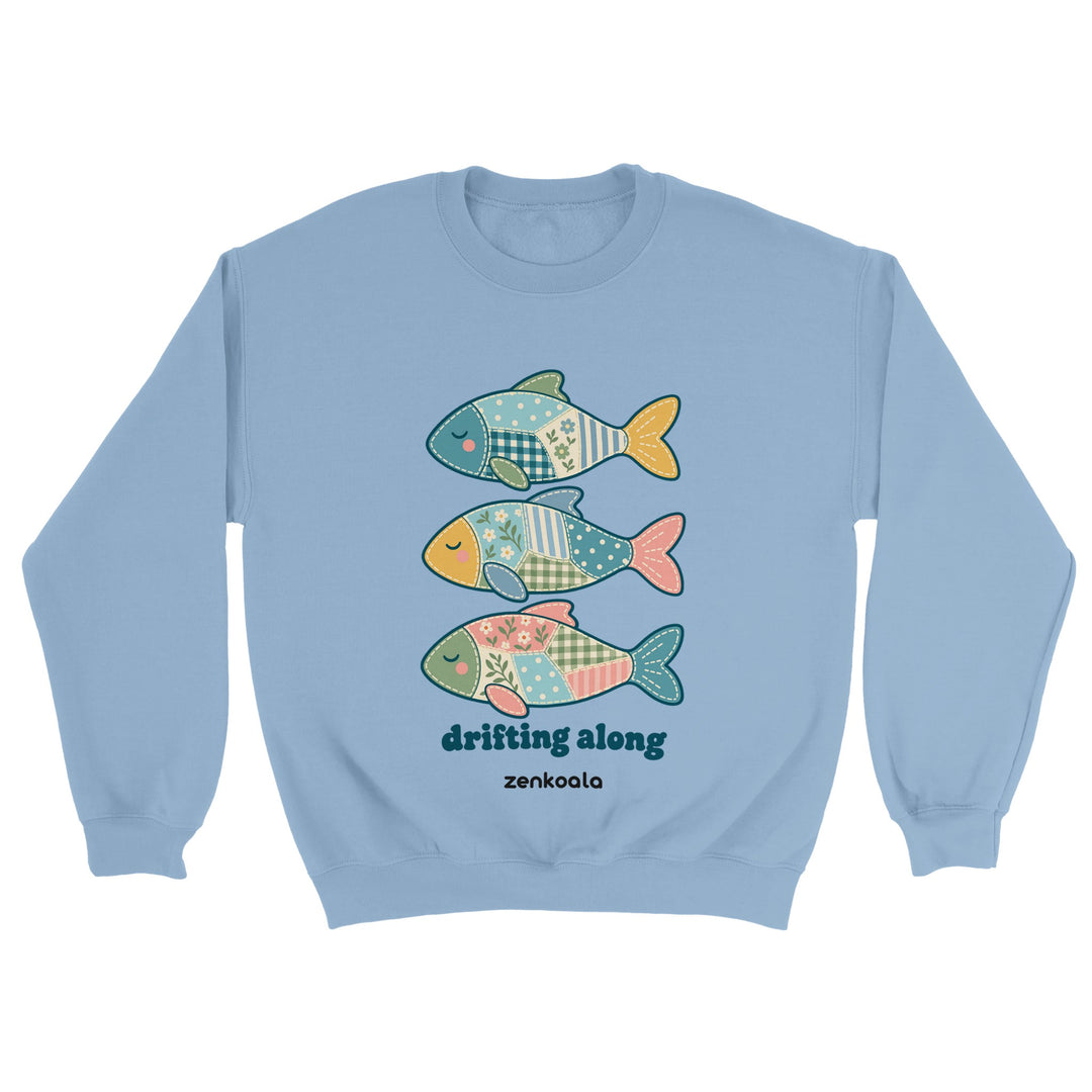Drifting Along Fish feel-good sweatshirt in light blue: three faux patchwork fish drifting in a line, Zen Koala Australia