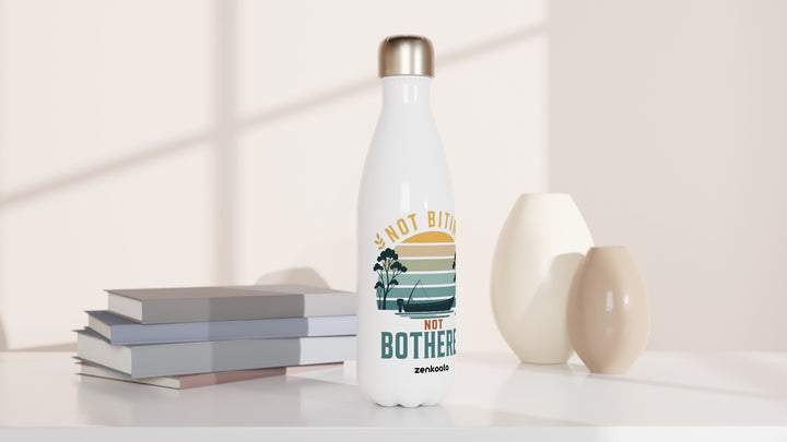 Not Biting Not Bothered water bottle beside books and vases, Zen Koala Australia