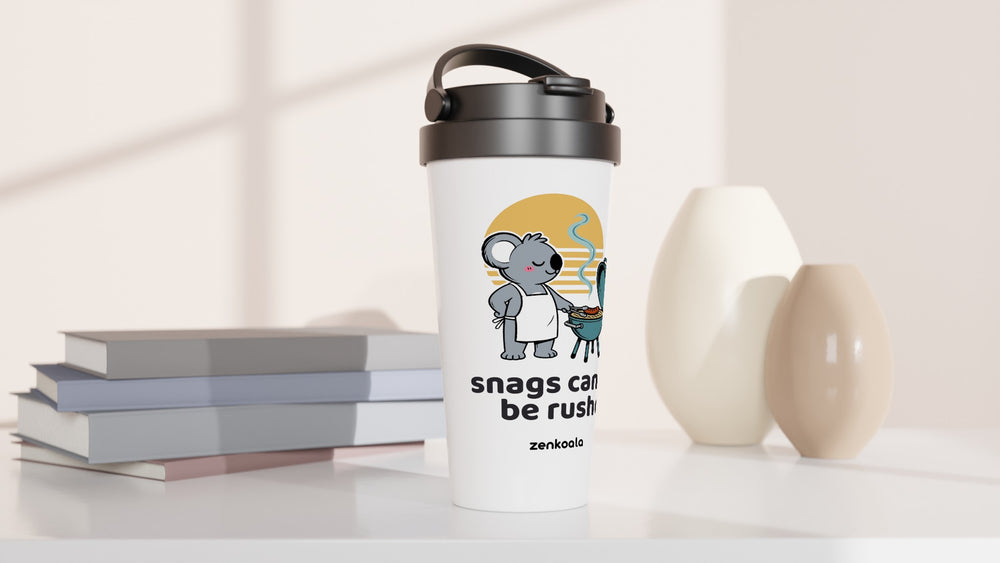 Snags Can't Be Rushed Koala BBQ travel mug beside books and vases, Zen Koala Australia