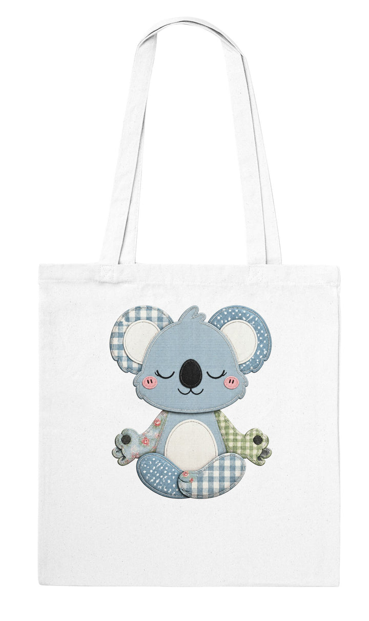 Faux Patchwork Meditating Koala feel-good tote bag in white: a faux patchwork meditating koala, Zen Koala Australia