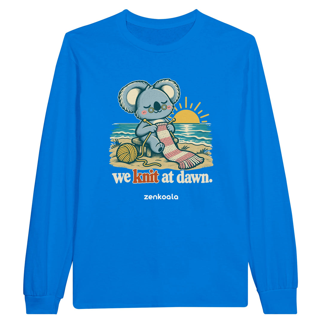 We Knit at Dawn feel-good long sleeve tee in royal: a koala knitting on the beach, Zen Koala Australia