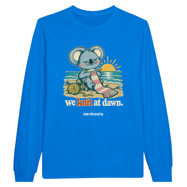 We Knit at Dawn feel-good long sleeve tee in royal: a koala knitting on the beach, Zen Koala Australia