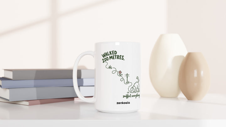 Sniffed Everything 15oz mug beside books and vases, Zen Koala Australia