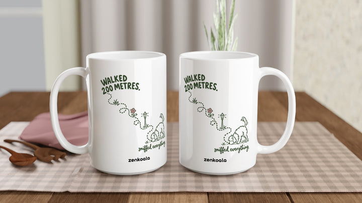 Two Sniffed Everything 15oz mugs on a table, showing both sides of the design, Zen Koala Australia