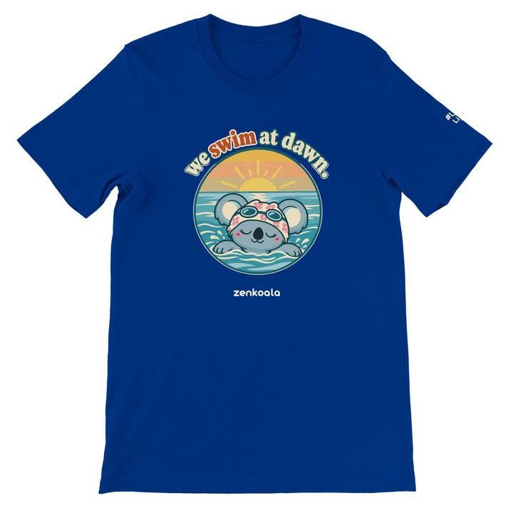 We Swim at Dawn feel-good tee in true royal: a koala swimming at sunrise, Zen Koala Australia