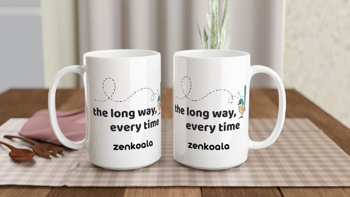 Two The Long Way Every Time 15oz mugs on a table, showing both sides of the design, Zen Koala Australia