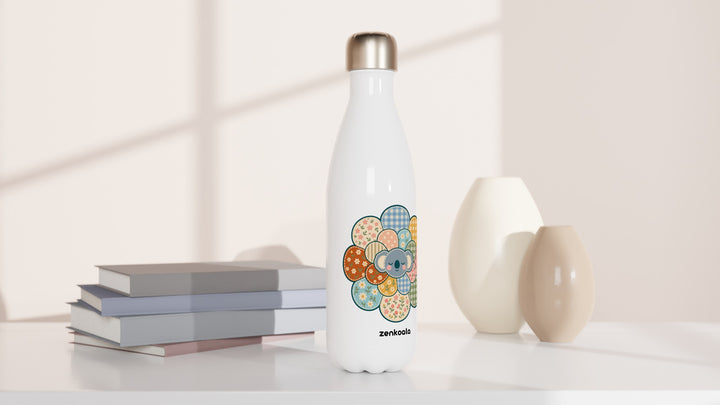 Zen Mandala Flower water bottle beside books and vases, Zen Koala Australia