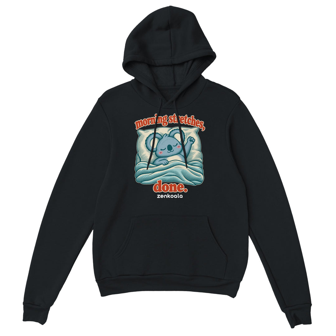 Morning Stretches Done feel-good hoodie in black: a koala in bed giving one big stretch, Zen Koala Australia