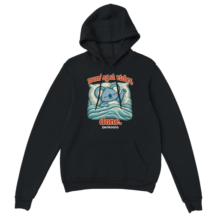 Morning Stretches Done feel-good hoodie in black: a koala in bed giving one big stretch, Zen Koala Australia