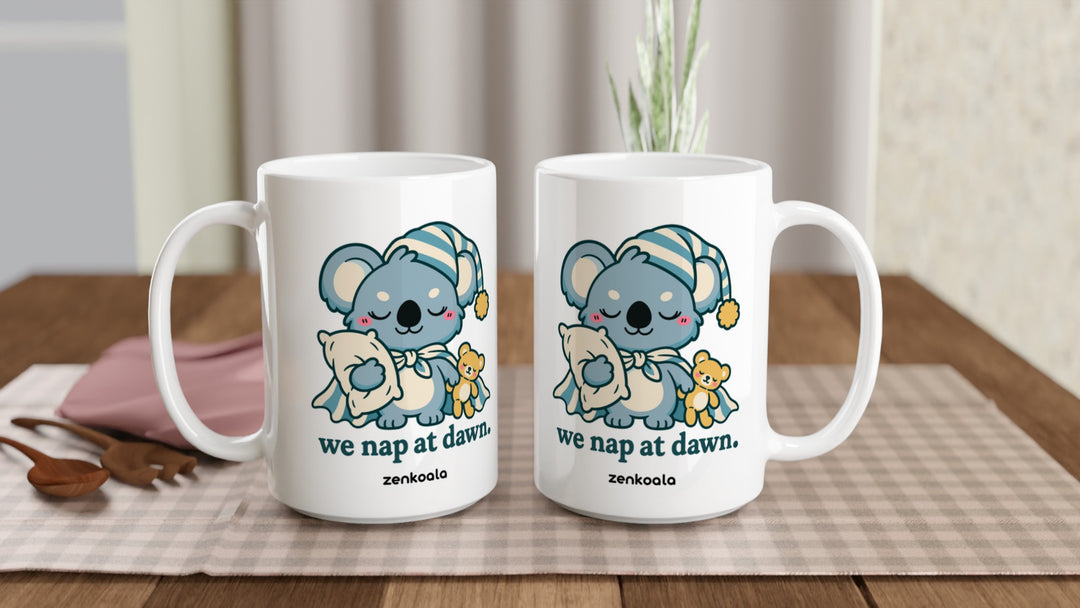Two We Nap at Dawn 15oz mugs on a table, showing both sides of the design, Zen Koala Australia