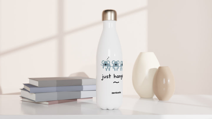 Just Hanging water bottle beside books and vases, Zen Koala Australia