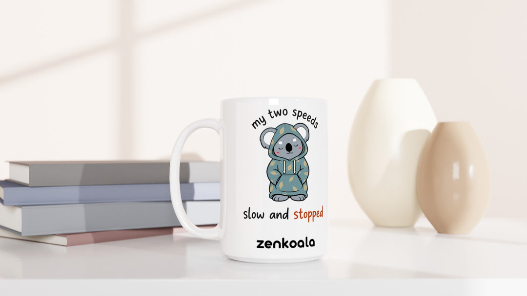 My Two Speeds Slow and Stopped 15oz mug beside books and vases, Zen Koala Australia