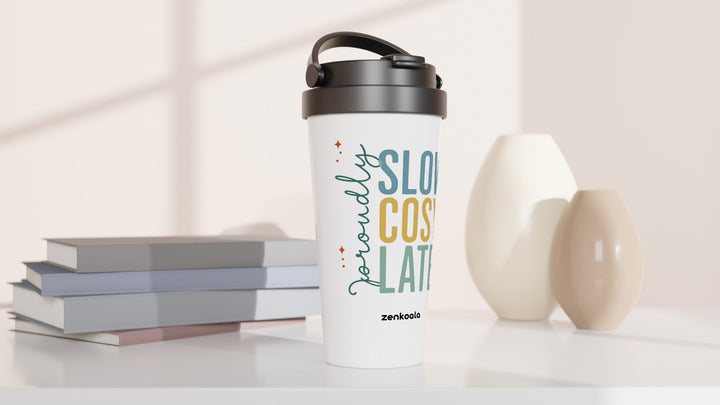Proudly Slow Cosy Late travel mug beside books and vases, Zen Koala Australia
