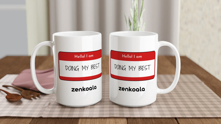 Two Doing My Best 15oz mugs on a table, showing both sides of the design, Zen Koala Australia