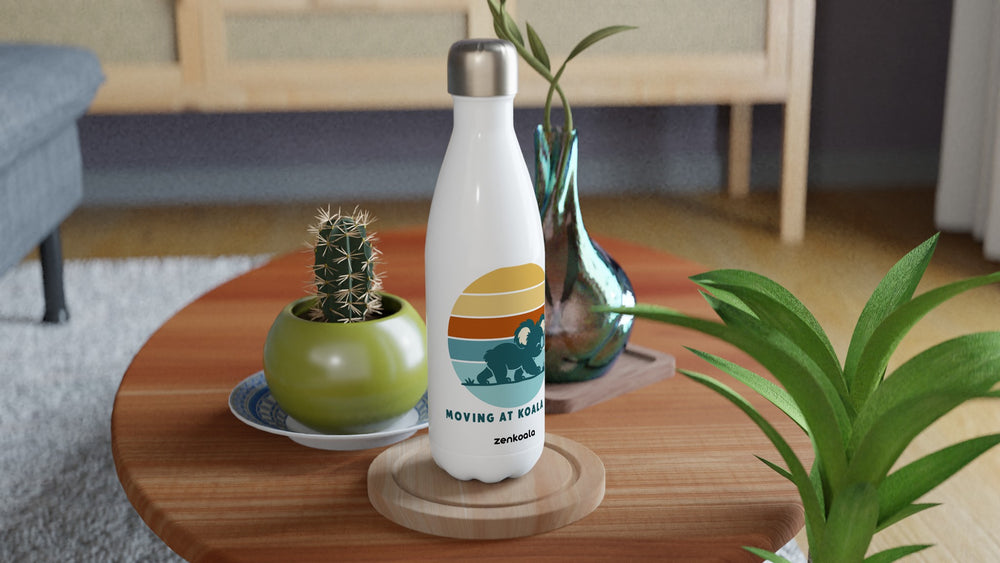 Moving at Koala Pace water bottle on a wooden table with a cactus, Zen Koala Australia