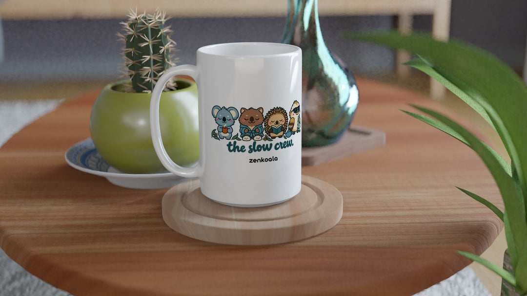 The Slow Crew 15oz mug on a wooden table with a cactus, Zen Koala Australia