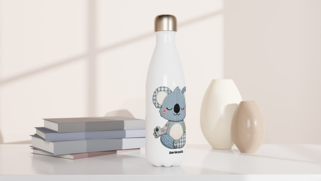 Faux Patchwork Meditating Koala water bottle beside books and vases, Zen Koala Australia