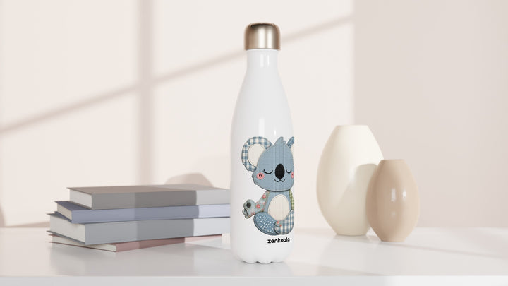 Faux Patchwork Meditating Koala water bottle beside books and vases, Zen Koala Australia