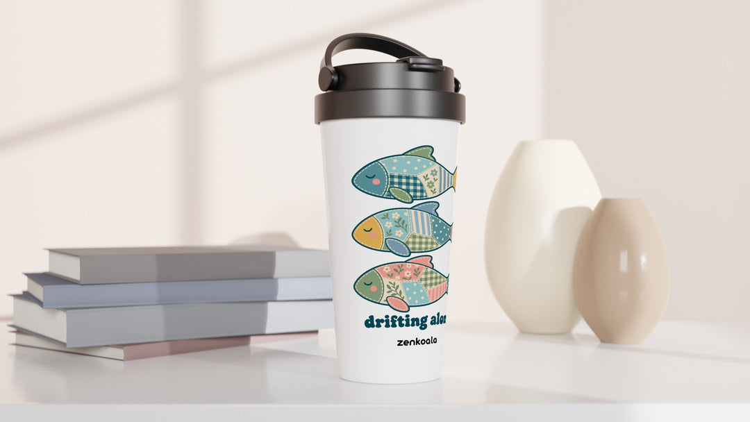 Drifting Along Fish travel mug beside books and vases, Zen Koala Australia