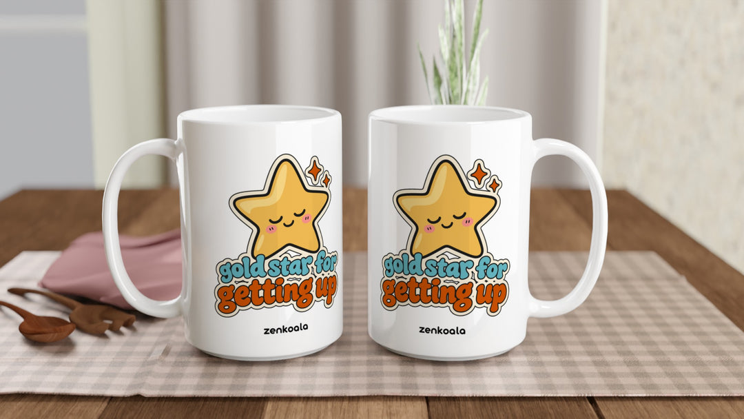 Two Gold Star for Getting Up 15oz mugs on a table, showing both sides of the design, Zen Koala Australia