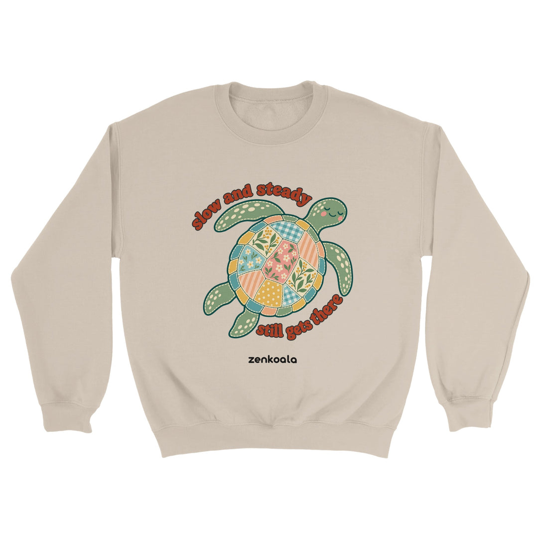 Slow and Steady Turtle feel-good sweatshirt in sand: a faux patchwork sea turtle, Zen Koala Australia
