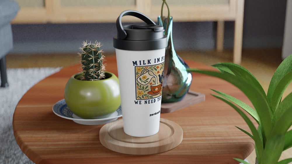 Milk in First travel mug on a wooden table with a cactus, Zen Koala Australia