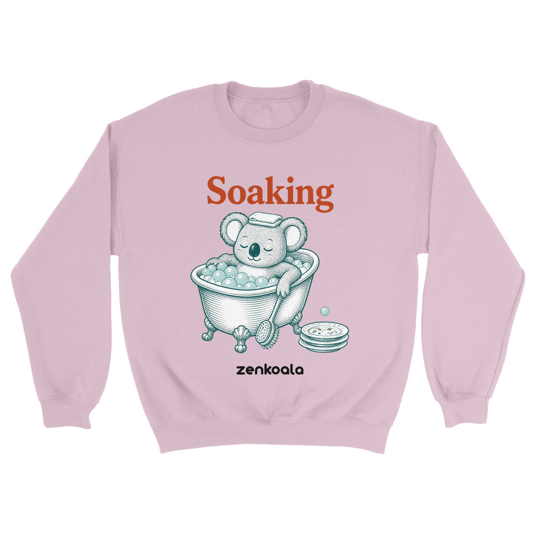 Soaking Koala Bath feel-good sweatshirt in light pink — a vintage engraved koala relaxing in a bubble bath, Zen Koala Australia