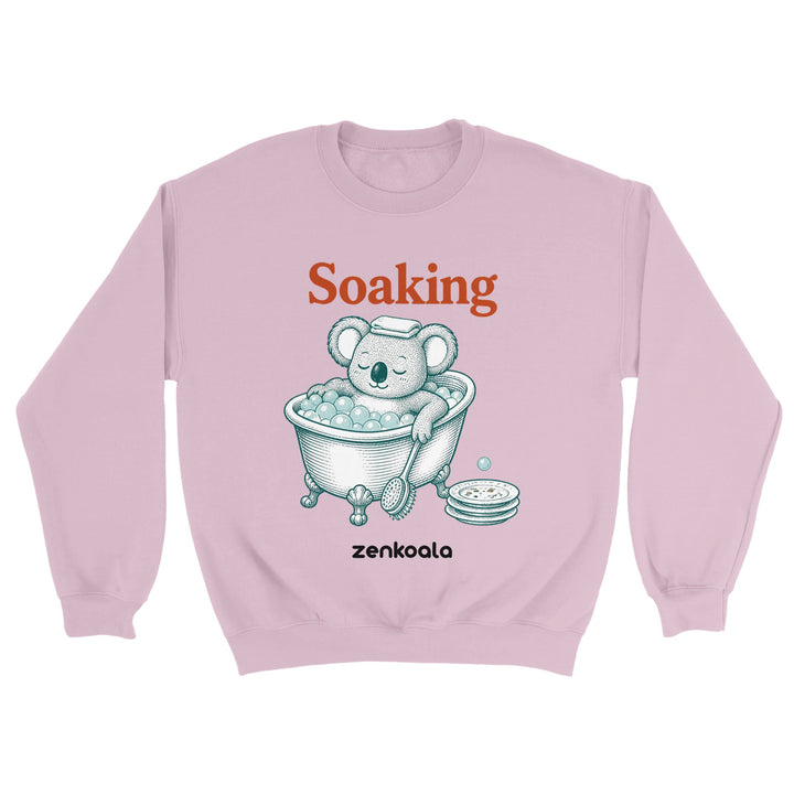 Soaking Koala Bath feel-good sweatshirt in light pink — a vintage engraved koala relaxing in a bubble bath, Zen Koala Australia