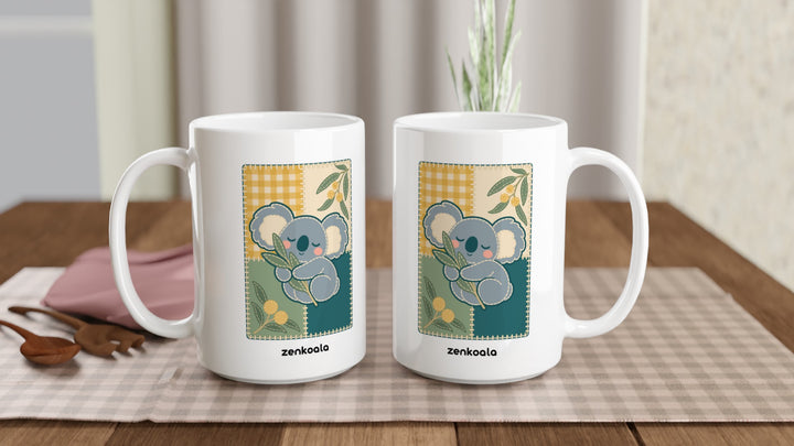 Two Koala Quilt 15oz mugs on a table, showing both sides of the design, Zen Koala Australia