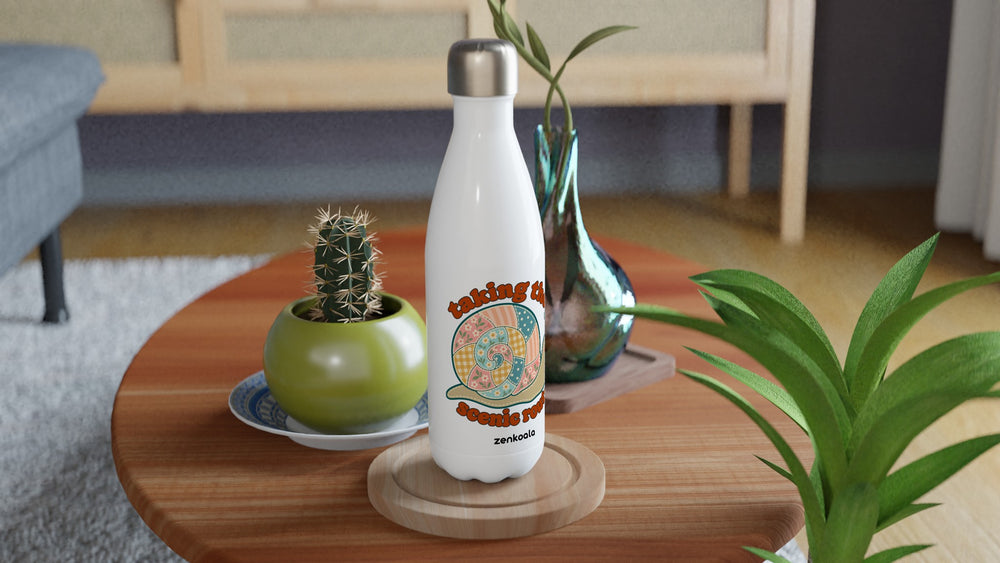 Taking the Scenic Route Snail water bottle on a wooden table with a cactus, Zen Koala Australia