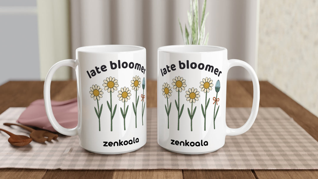 Two Late Bloomer 15oz mugs on a table, showing both sides of the design, Zen Koala Australia