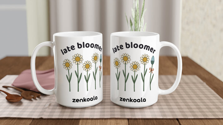 Two Late Bloomer 15oz mugs on a table, showing both sides of the design, Zen Koala Australia