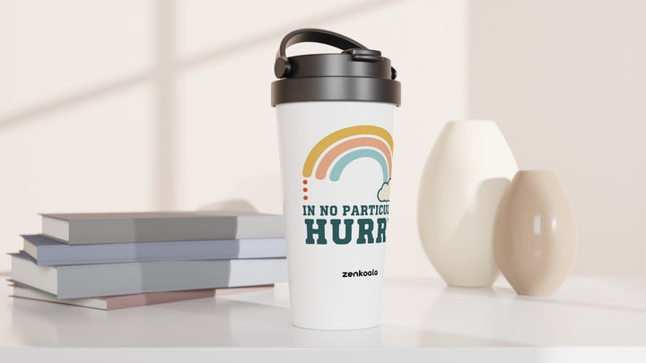 In No Particular Hurry travel mug beside books and vases, Zen Koala Australia