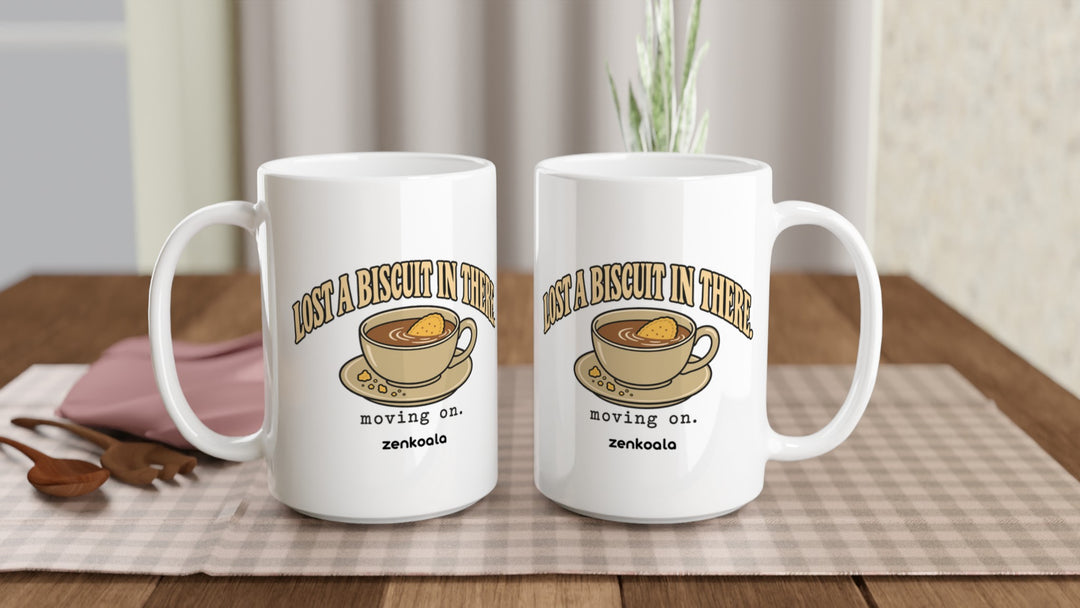 Two Lost a Biscuit in There 15oz mugs on a table, showing both sides of the design, Zen Koala Australia