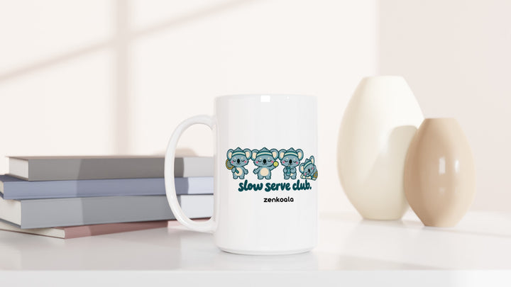 Slow Serve Club 15oz mug beside books and vases, Zen Koala Australia