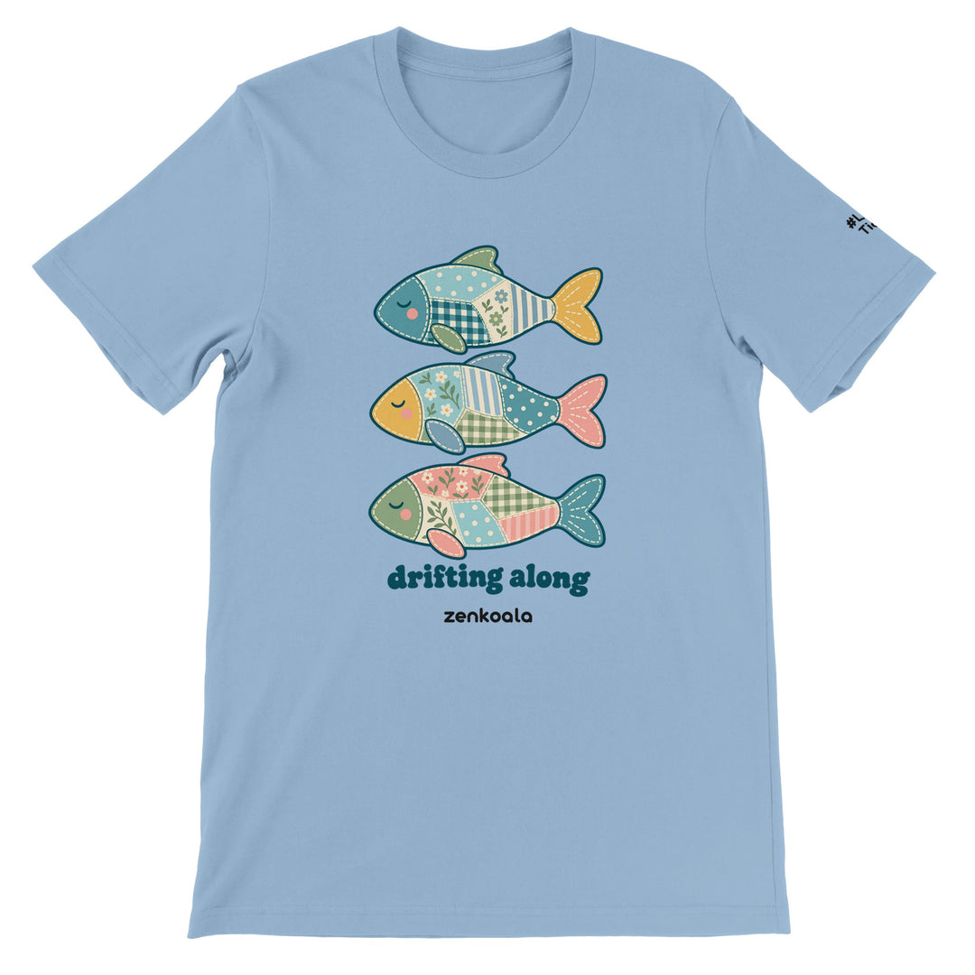 Drifting Along Fish feel-good tee in light blue: three faux patchwork fish drifting in a line, Zen Koala Australia