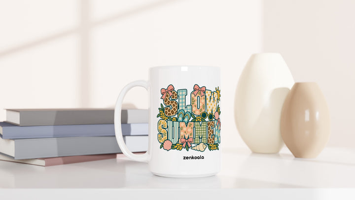 Slow Summer 15oz mug beside books and vases, Zen Koala Australia
