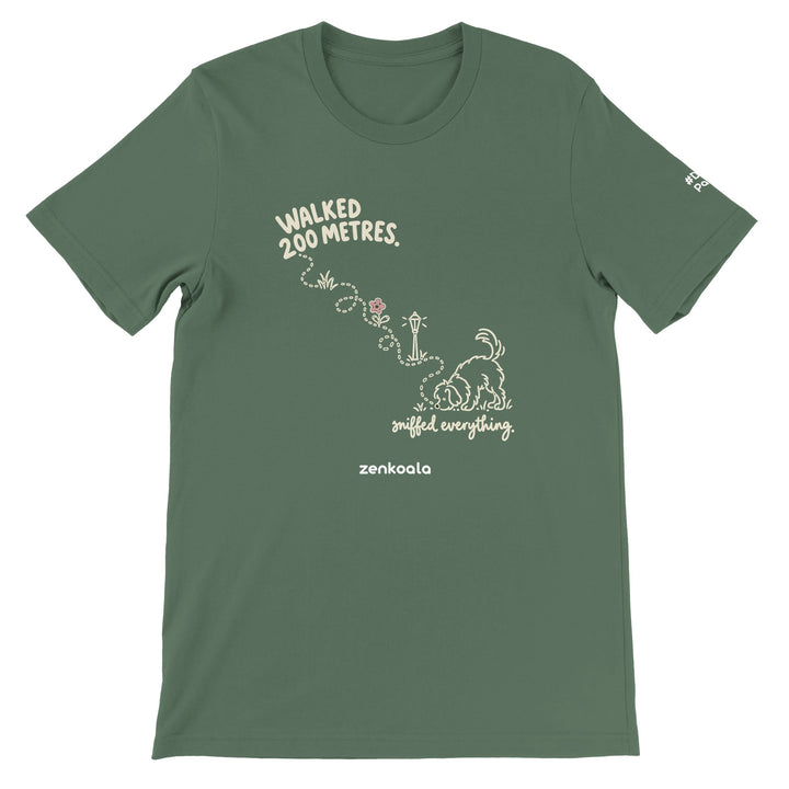 Sniffed Everything feel-good tee in military green: a little dog on a winding walk, Zen Koala Australia