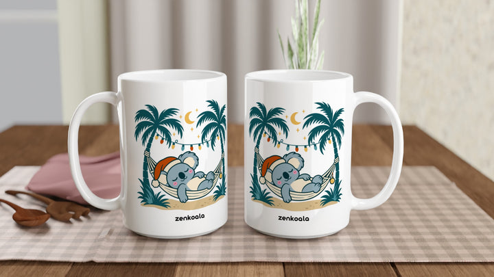 Two Koala Santa Hammock 15oz mugs on a table, showing both sides of the design, Zen Koala Australia