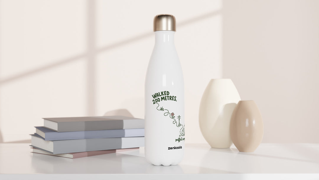 Sniffed Everything water bottle beside books and vases, Zen Koala Australia