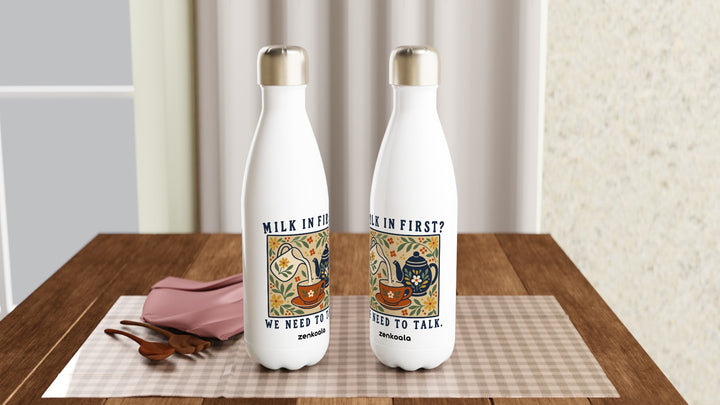 Two Milk in First water bottles on a table, Zen Koala Australia