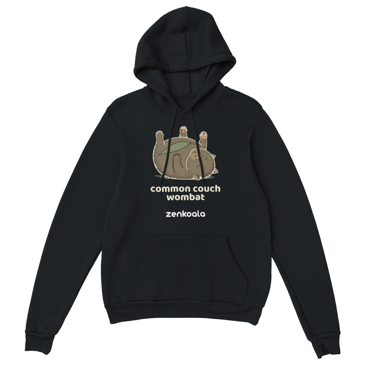 Common Couch Wombat feel-good hoodie in Black — a wombat flat out on its back with a gum leaf, Zen Koala Australia