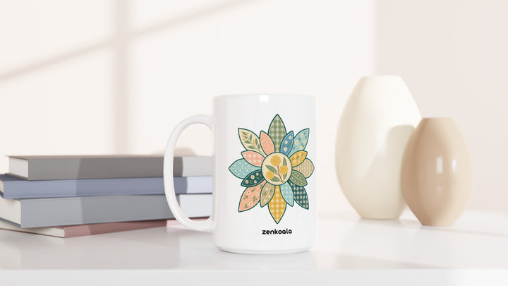 Wattle Mandala 15oz mug beside books and vases, Zen Koala Australia