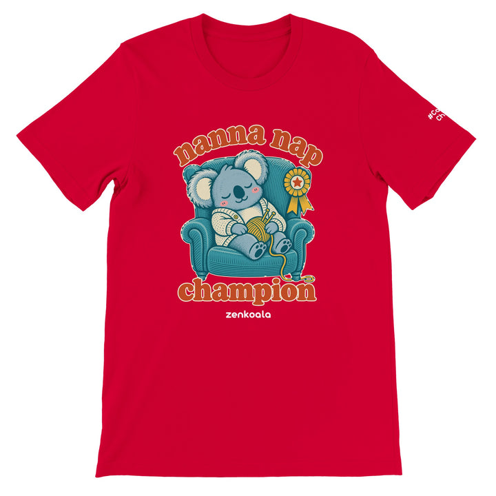 Nanna Nap Champion feel-good tee in red: a koala asleep in an armchair with knitting and a prize ribbon, Zen Koala Australia