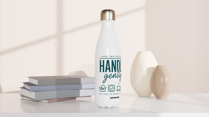 Handle Gently Care Instructions water bottle beside books and vases, Zen Koala Australia