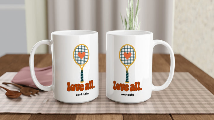 Two Love All 15oz mugs on a table, showing both sides of the design, Zen Koala Australia