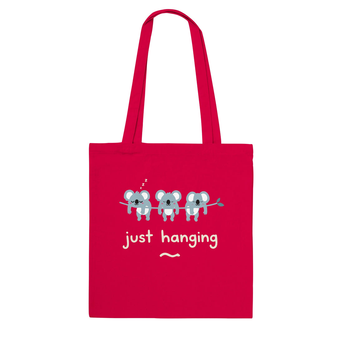 Just Hanging feel-good tote bag in red: three sleepy koalas hanging off a branch, Zen Koala Australia