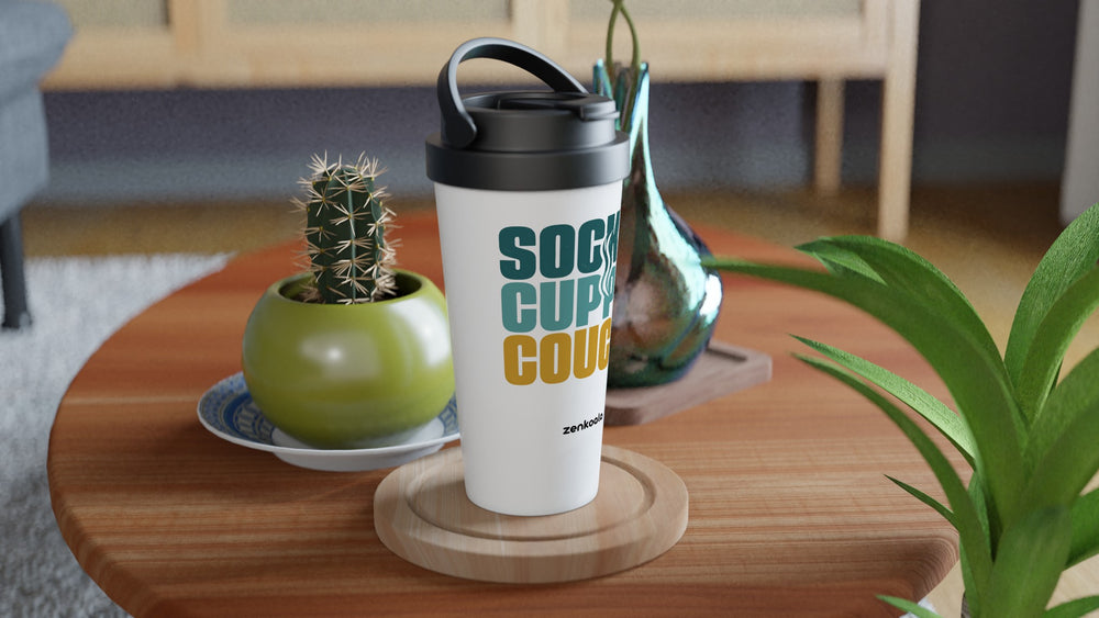 Socks Cuppa Couch travel mug on a wooden table with a cactus, Zen Koala Australia
